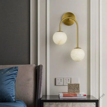 Alabaster Glo Modern Wall Sconce In Bedroom