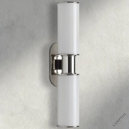 Lampthe Harlin double sconce with milk glass shades and polished chrome accents, modern sophistication.