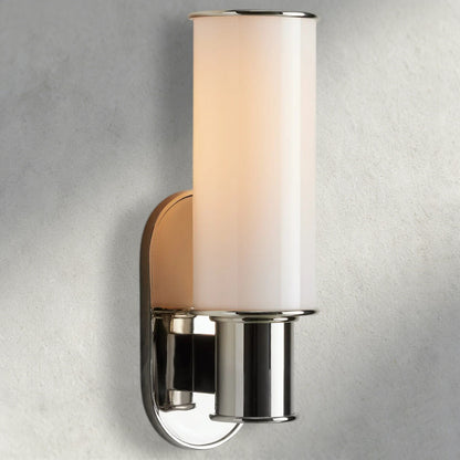 Lampthe Harlin Sconce in Milk, a modern wall light with a white frosted glass cylinder and polished nickel accents.