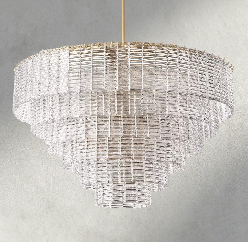 Lampthe Sirene clear glass round chandelier with textured glass cascading in concentric rings. Modernist style.